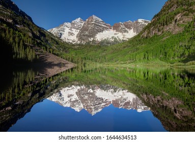 Maroon Bells And Aspen Trees Reflected In Maroon Lake