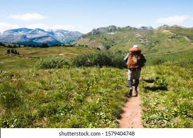 MAROON BELLS, COLORADO -SEPTEMBER 12, 2019: Experienced Backpackers Hike Their Way Around The Maroon Bells, Completing The Four Pass Loop On A 2 Night Wilderness Camping Trip