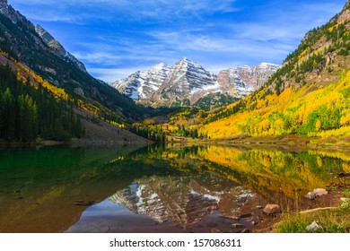 Maroon Bells and its Reflection in Maroon Lake  as Fall foliage in Peak at Aspen, Colorado - Shutterstock ID 157086311