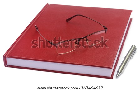 Maroon colored thesis paper with spectacles over white background