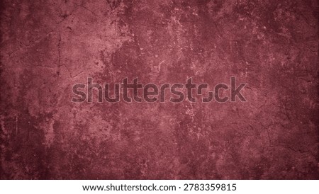 maroon grunge texture background featuring cracks and a distressed surface. The image displays a grainy, dark red pattern suitable for various design applications.