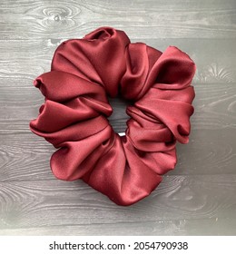 Maroon soft silk extra large scrunchie - Powered by Shutterstock