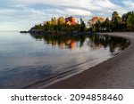 Marquette Harbor Lighthouse at sunset in the fall along Lake Superior