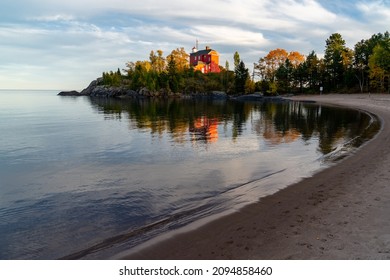 Marquette Harbor Lighthouse At Sunset In The Fall Along Lake Superior