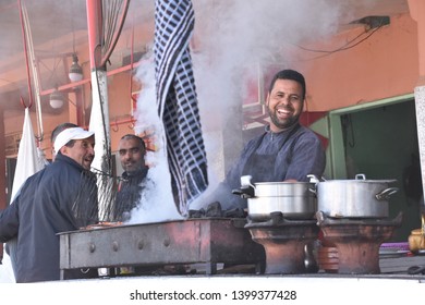 Marrakech,Marrakesh-Safi/ Morocco - 02/13/2019: Happy Moroccan Chef Cooking Outside.