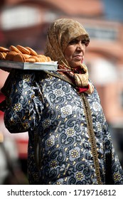 Marrakesh, Morocco - 06/18/2012 - Woman Selling Moroccan Semolina Cookies