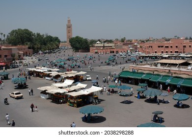 MARRAKESH, MOROCCO - Jul 25, 2021: A High Angle Shot Of People And Stalls In A Busy Market In Marrakesh City Square