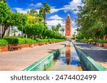 Marrakesh, Morocco. Koutoubia Mosque minaret at Medina quarter, beautiful spring blue sky.