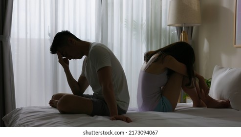 Marriage Problem Relationship Difficulties Concept - Asian Young Couple Sitting Separately On Bed Are Sad After Having Argument And Angry Conflict