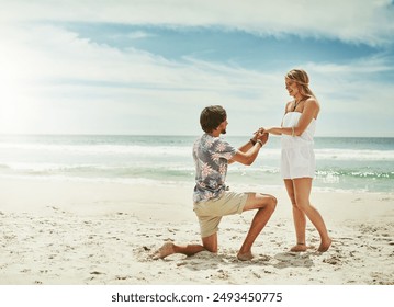 Marriage, proposal and couple with love at beach for engagement, surprise and happiness on vacation. Blue sky, waves and man with asking on knee for romantic gesture, question and holiday in Venice - Powered by Shutterstock