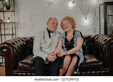 Married Couple. Older Man And Woman Hugging Each Other And Smiling. Old Man And Senior Woman Dancing. Happy Senior Couple