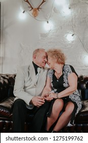 Married Couple. Older Man And Woman Hugging Each Other And Smiling. Old Man And Senior Woman Dancing. Happy Senior Couple