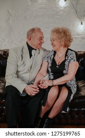 Married Couple. Older Man And Woman Hugging Each Other And Smiling. Old Man And Senior Woman Dancing. Happy Senior Couple