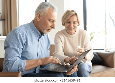 Married couple using laptop, buying medication online, searching lower price or discount on pills. Senior man and middle aged woman checking remedy information on pharmacy website - Powered by Shutterstock