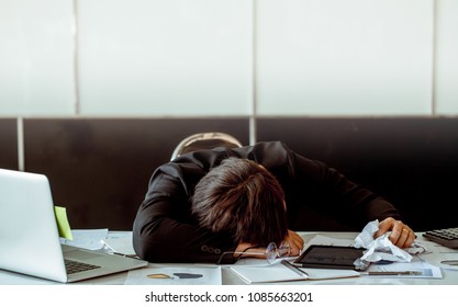 Married officer worked hard until he is nap at work. In his hand there is a crumpled paper. He may dreaming. - Shutterstock ID 1085663201