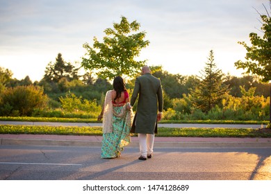 Married South Asian Couple Walking  