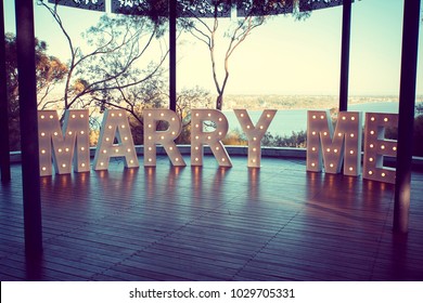 Marry Me Sign On Top Of Hill Under Gazebo