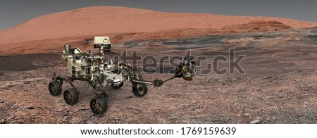 Mars. The Perseverance rover deploys its equipment against the backdrop of a true Martian landscape. Exploring Mission To Mars. Colony on Mars. Elements of this video furnished by NASA.