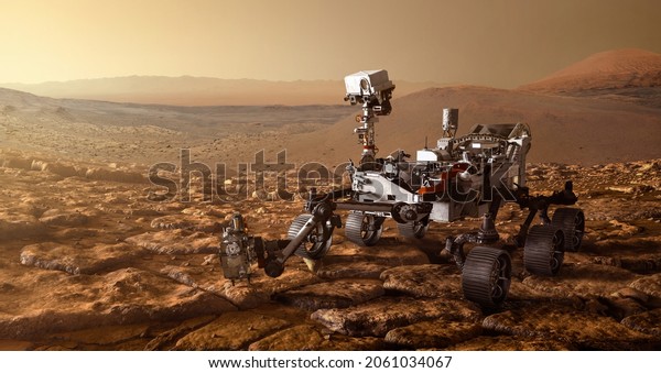Mars Rover is exploring surface of\
Mars. Mission Mars exploration of red planet. Space exploration,\
science concept. .Elements of this image furnished by\
NASA.