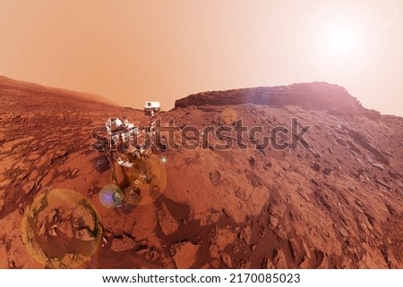 Mars rover on the red planet. Elements of this image furnished by NASA. High quality photo
