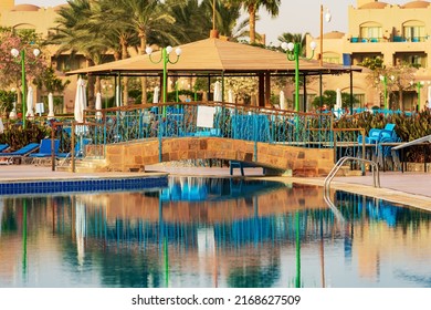 MARSA ALAM, EGYPT - OCT 31, 2018: Empty swimming pool in a tourist village in Egypt, tourist resort on the coast of Red Sea, Sahara desert, Marsa Alam, Africa.