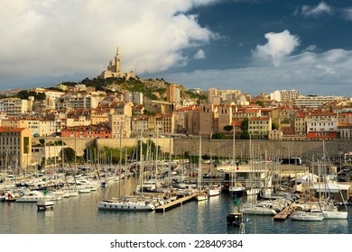 Marseille cityscape with famous landmark Notre Dame de la Garde church, France.