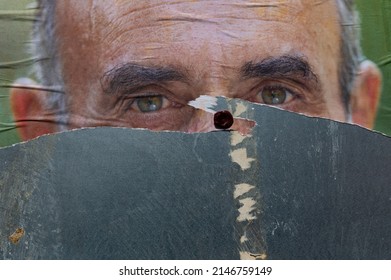 Marseille, France, 02-04- 2022: A Torn Poster Of Éric Zemmour With Only The Eyes Appear