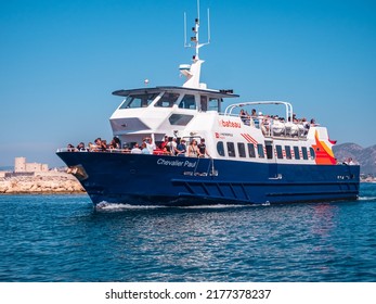 Marseille, France - July 10 2022 : 
La Métropole shuttle boat making the connection between Marseille, the Frioul islands and the Chateau d'If. Tourist on board, Mediterranean Sea and Chateau d'If.