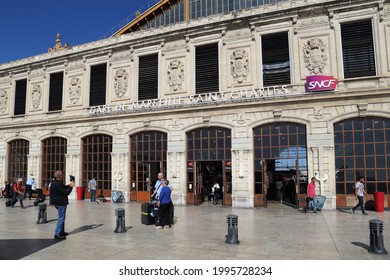 Marseille, France - September 27, 2019: Travelers take pictures in front of the Saint Charles central railway station of Marseille in Marseille, France on September 27, 2019
