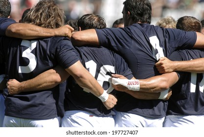 MARSEILLE, FRANCE-SEPTEMBER 08, 2007: italian rugby players embracing before the rugby match Italy vs New Zealand, during the Rugby World Cup of France 2007, in Marseille.