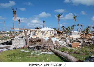 MARSH HARBOR, ABACO ISLAND, THE BAHAMAS - November 10, 2019: Destruction from hurricane Dorian showing debris and structural damage to buildings and trees.