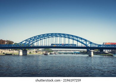 Marshal Piłsudski Bridge. Blue Steel Construction On The Vistula River. Cracow, Poland