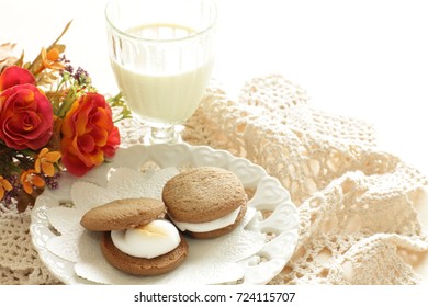 Marshmallow And Cookie Sandwich With Milk For Kid Meal Image