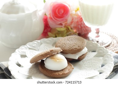 Marshmallow And Cookie Sandwich With Milk For Kid Meal Image