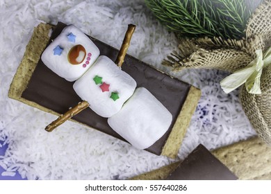Marshmallow Snowman On A Chocolate Bar