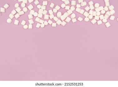 Marshmellows On Pink Bacgkround. White Marshmellow Desert On Pink. Sweet Bacgkround With Copy Space