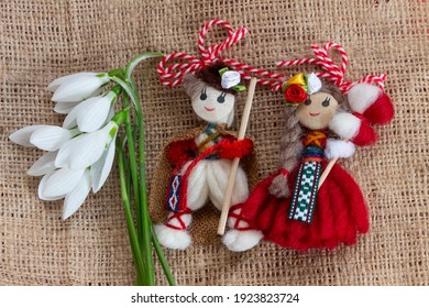 Martenitsa - traditional Bulgarian custom - fabric background with snowdrops