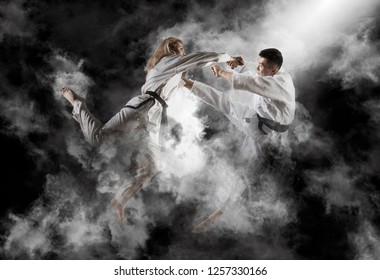 Martial Arts Masters, Karate Practice. Smoke Background