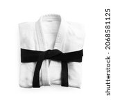 Martial arts uniform with black belt on white background, top view