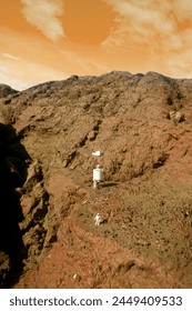 Martian base diorama whith astronauts exploring Mars on a natural landscape. in 
