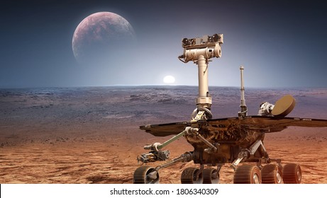 Martian rover Curiosity on surface of red planet Mars. Research of red planet. Perseverance 2020 rover. Elements of this image furnished by NASA - Shutterstock ID 1806340309