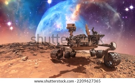 Martian rover Mission. Red planet Mars and rover in space. Planets of solar system exploration. Elements of this image furnished by NASA