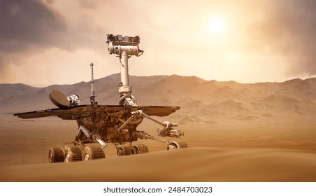 Martian rover on surface of red planet. Mars exploration. Mars rover on sand with red sky and sun. Solar system expedition. Not AI content. Elements of this image furnished by NASA