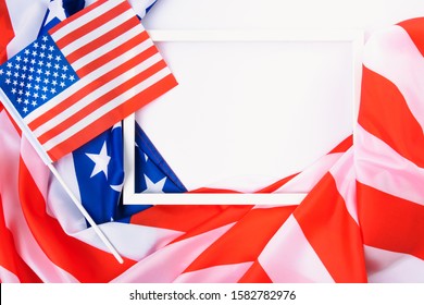 Martin Luther King Day, Flat Lay Top View, American Flag And Photo Frame On White Background With Copy Space For Your Text