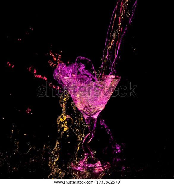 Martini glass with a neon splash of\
colorful drink in purple red green yellow neon\
colors