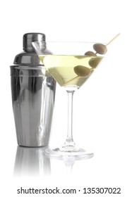 Martini Glass With Olives And Shaker Isolated On White