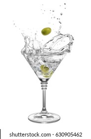 martini in glass with splashes isolated on white background. Green olive is falling in the alcohol cocktail