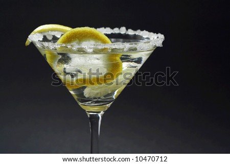 Martinis with sugar crust, lemon and peels