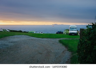 Martin's Haven, Wales - June 30, 2017: View From West Hook Farm Camping With St. Brides Bay In The Background At Sunset - Pembrokeshire United Kingdom