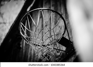 Martinsburg, WV / USA - March 10, 2018: A basketball hoop remains hung on the side of an abandoned barn in Martinsburg, WV, winter of 2018